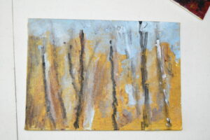 A painting of trees in the woods with yellow and brown.